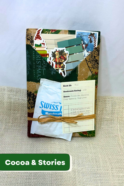 Book wrapped in holiday paper with pockets holding holiday stickers, holiday bookmark, sticky notes, sticky tabs, hot chocolate packet, and description of the book.