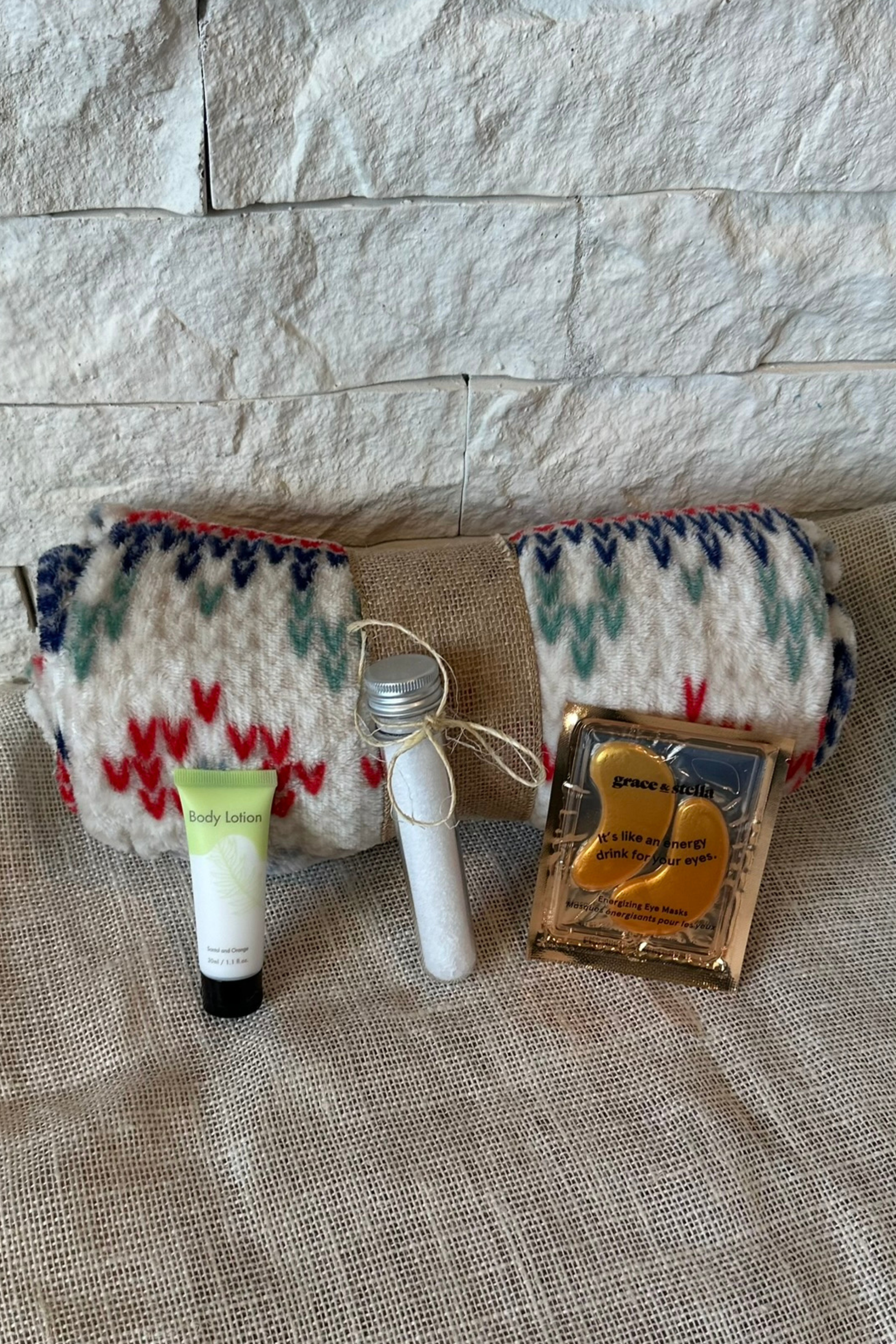 Snuggle Up companion kit with fleece blanket, body lotion, bath salts, and eye mask